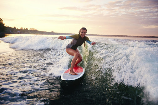 how to ride on a surfboard