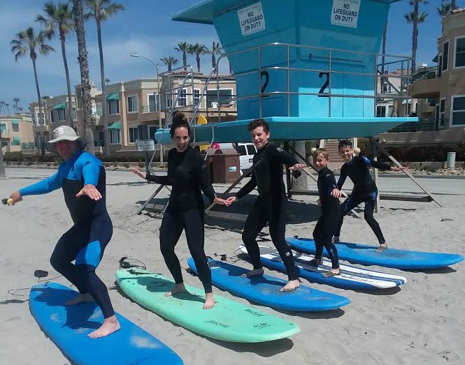 when families learn to surf together