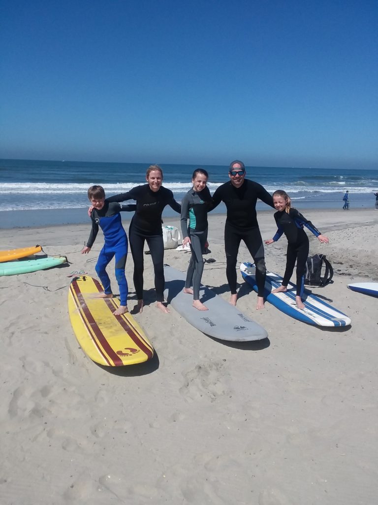 families take surf lessons in Oceanside