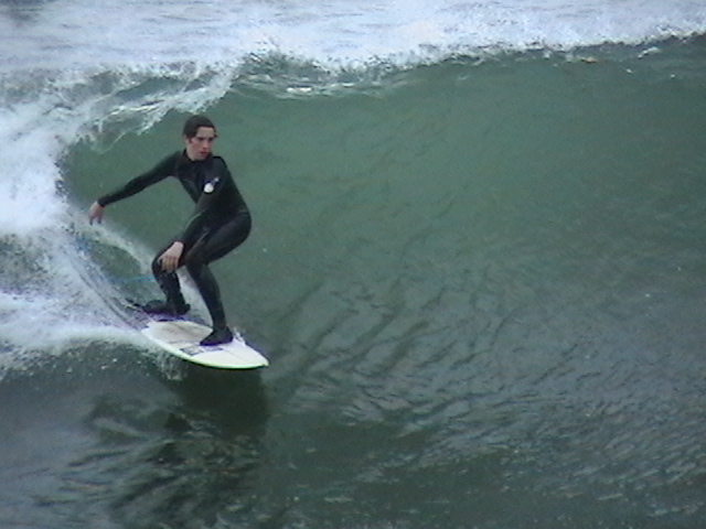 surfing at the Oceanside Pier